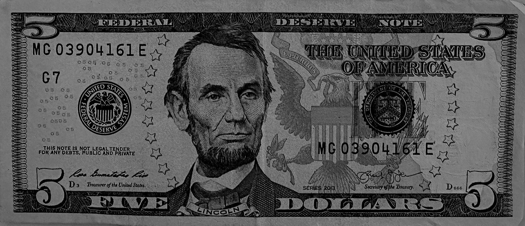 front of $5 bill